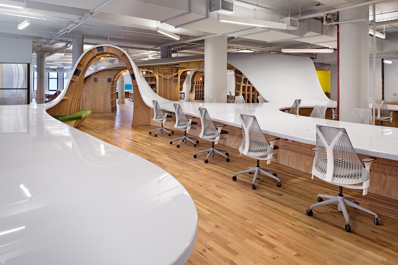 Illustration for article titled This gorgeous office has an endless desk made by robots